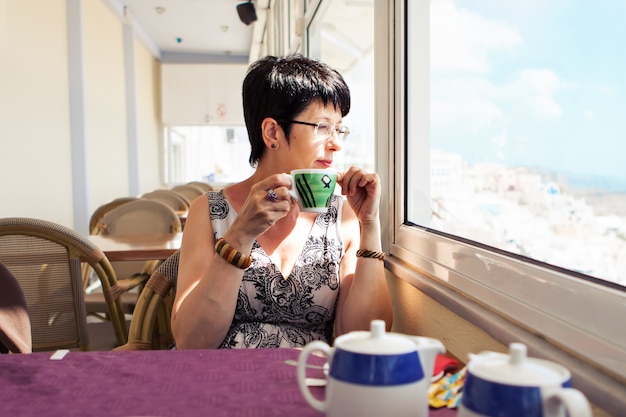 Beautiful Woman With Cup of Tea or Coffee