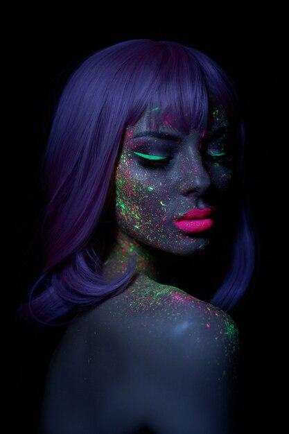 Beautiful woman with fluorescent make up