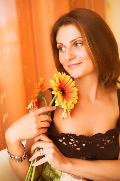 Beautiful woman with gerber