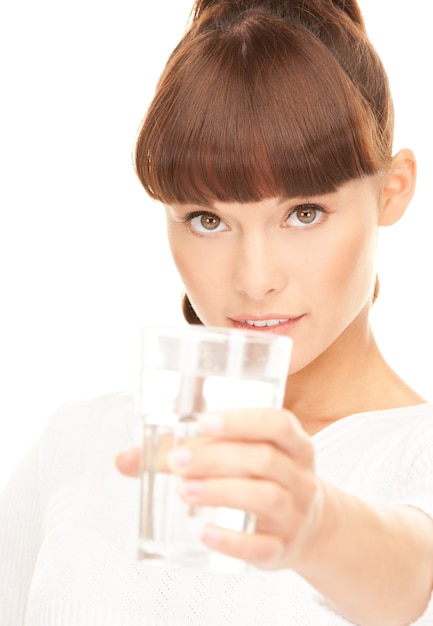 beautiful woman with glass of water over white