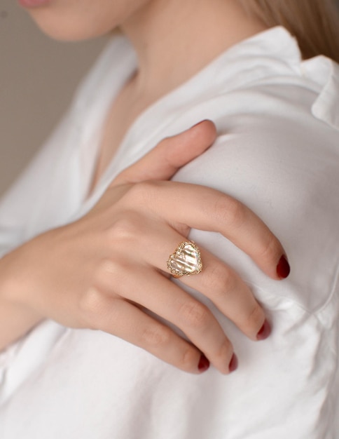 beautiful woman with gold jewelry