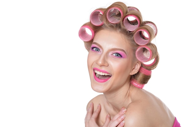 Beautiful woman with hair curlers