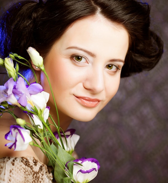 Beautiful woman with lilac flower