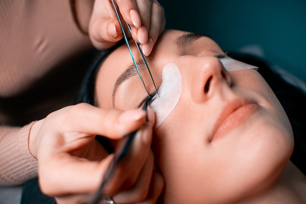 Beautiful Woman with long eyelashes in a beauty salon