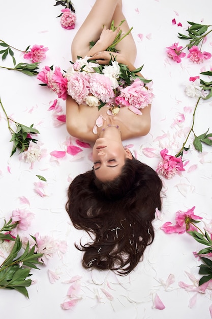 Beautiful woman with lots of pink flowers