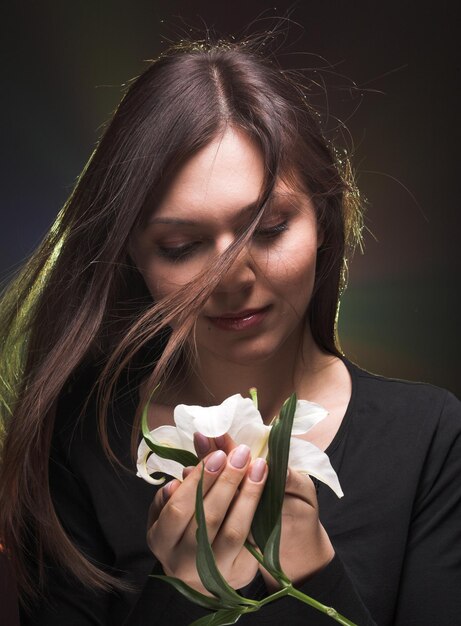 Beautiful woman with madonna lily