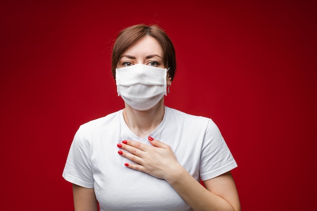 Beautiful woman with medical mask is sick