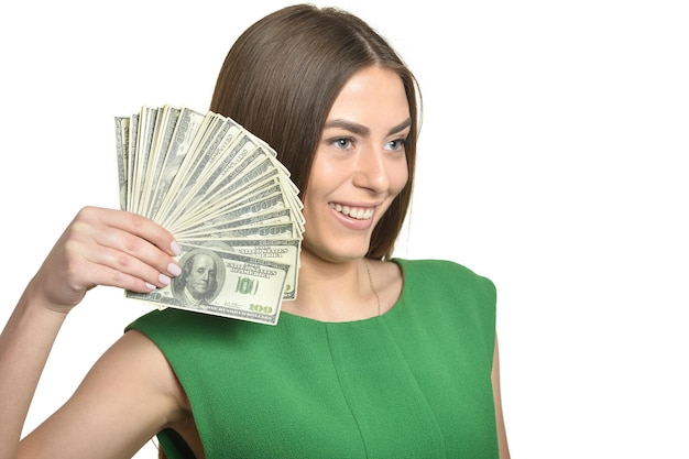 Beautiful woman with money on white background