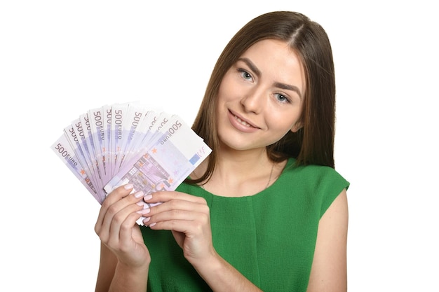 Beautiful woman with money on white background