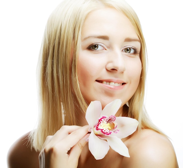 Beautiful woman with pink flower