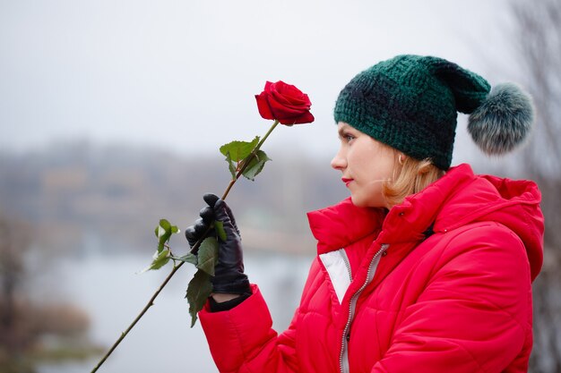 Beautiful woman with a rose