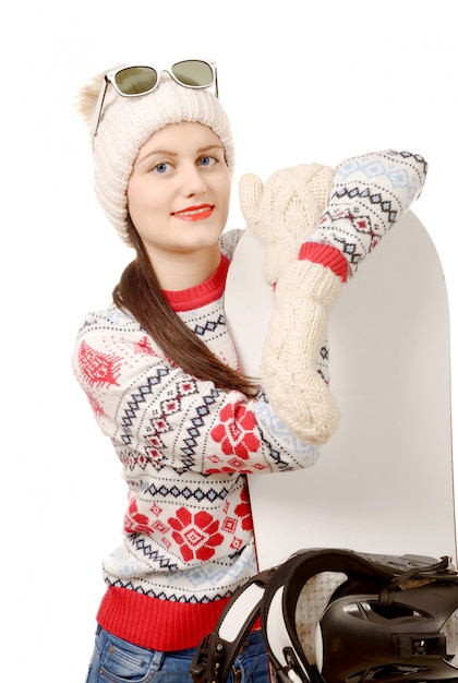 Beautiful woman with a snowboard