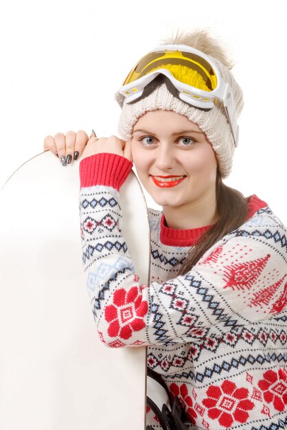 Photo beautiful woman with a snowboard