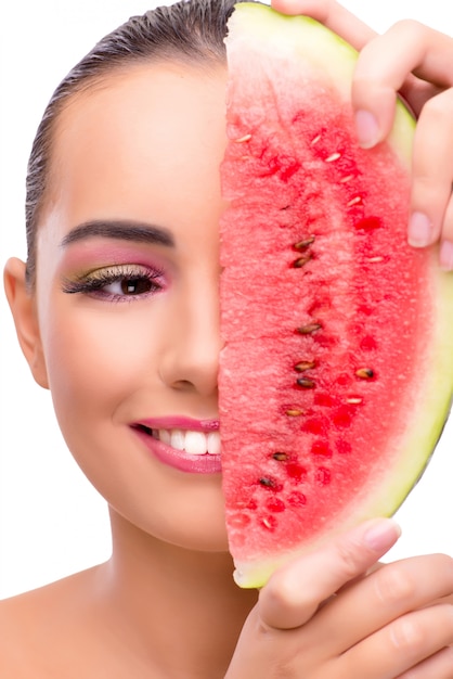 Beautiful woman with watermelon isolated on white