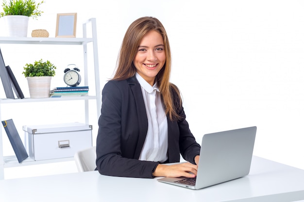 A beautiful woman working at the office isolated 