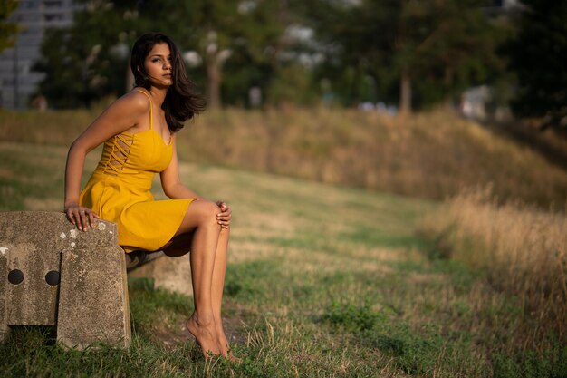 Beautiful woman in yellow dress