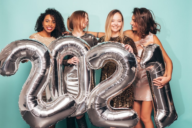 Beautiful Women Celebrating New Year.Happy Gorgeous Female In Stylish 