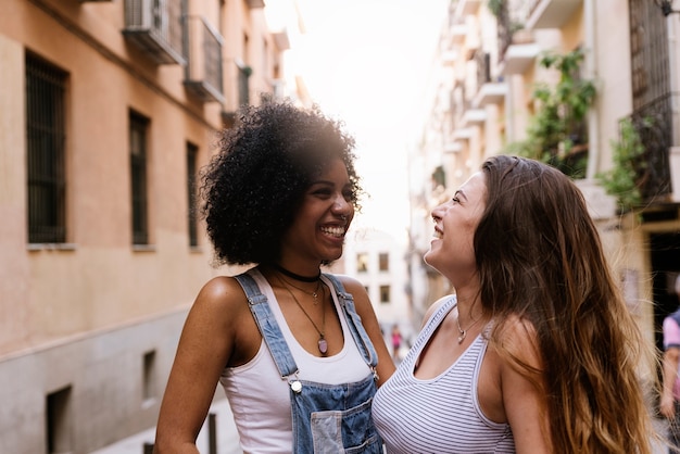 Beautiful women having fun in the street. Youth concept.