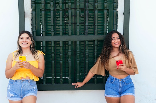 Beautiful Women Using A Mobile In The Street