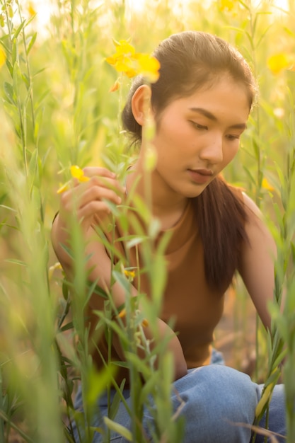 Beautiful Women With Flower Crotalaria