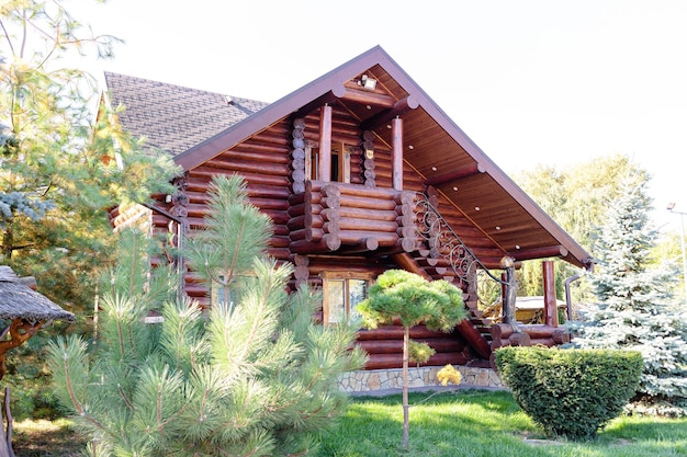 Beautiful wooden gazebo for outdoor recreation Place in nature with a wooden house