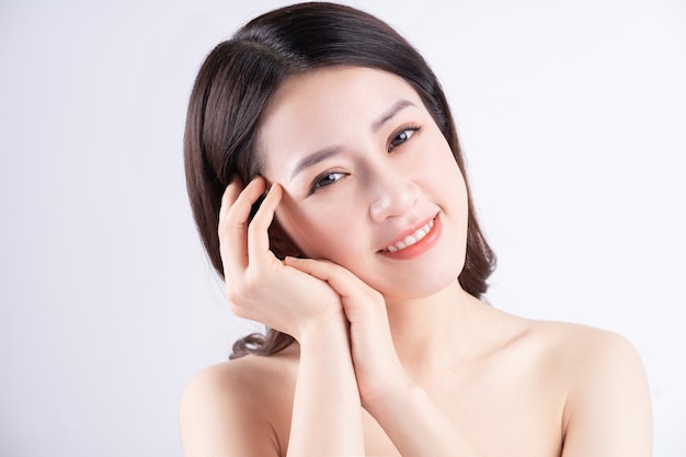 Beautiful xing woman with fresh skin smiling