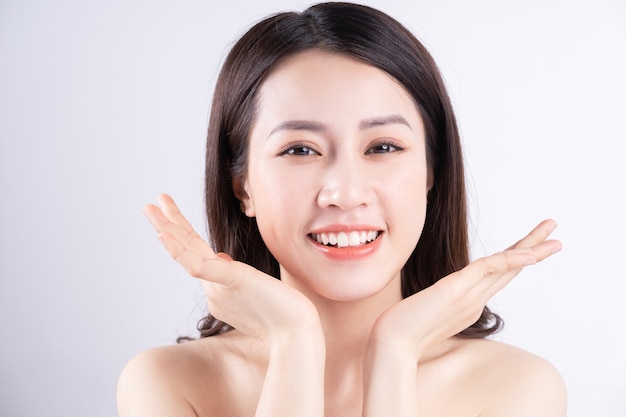 Beautiful xing woman with fresh skin smiling