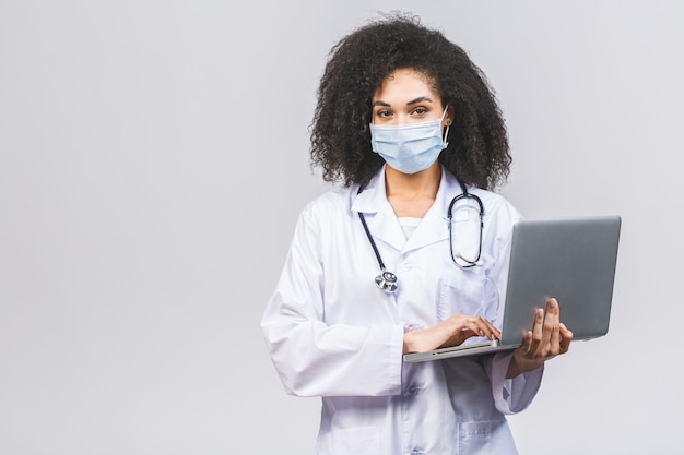 Beautiful young African American doctor in uniform