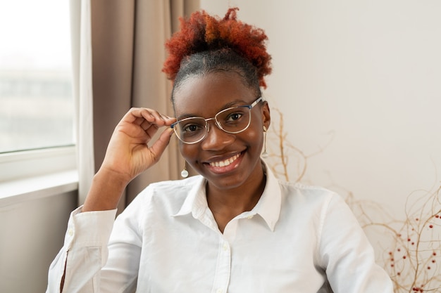 beautiful young african woman wearing glasses