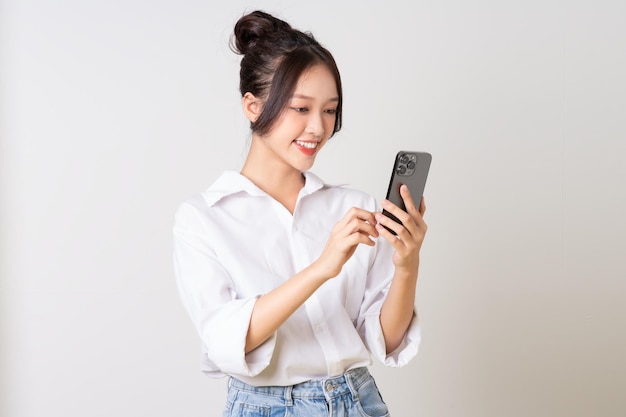 Beautiful young asian businesswoman portrait on white background