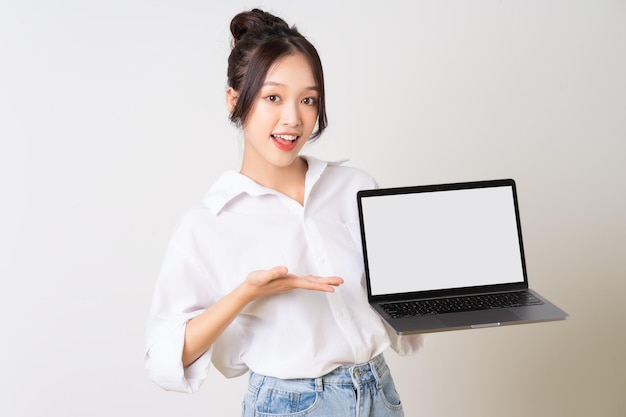 Beautiful young asian businesswoman portrait on white background