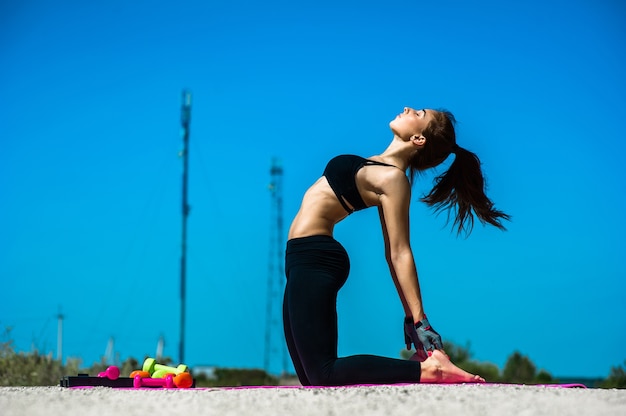 beautiful young athlete engaged Outdoor