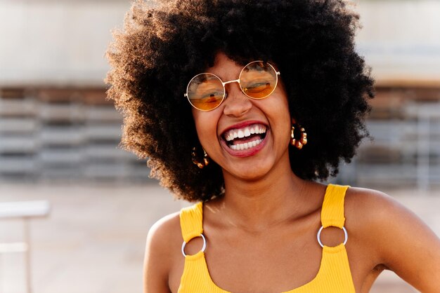 Beautiful young black woman outdoors in the city