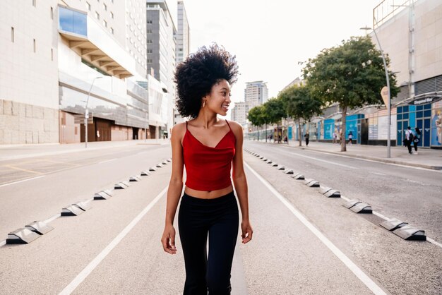 Beautiful young black woman outdoors in the city