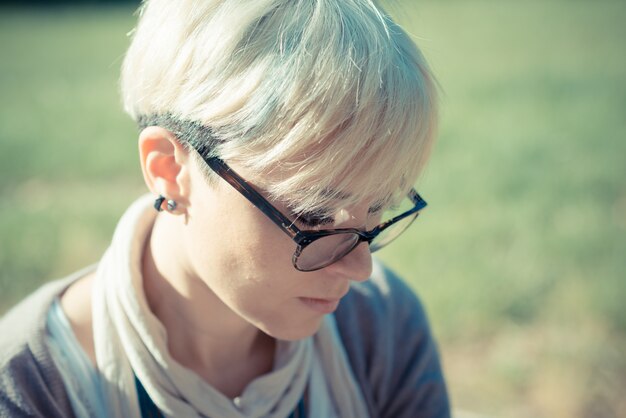 beautiful young blonde short hair hipster woman