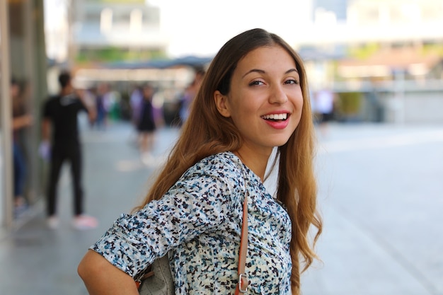 Beautiful young brunette woman smiling