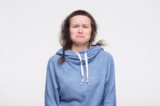 Beautiful young caucasian woman looking angry and frustrated