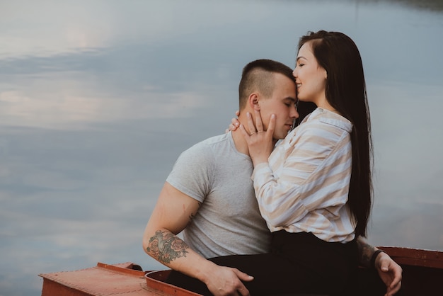 Beautiful young couple near a river