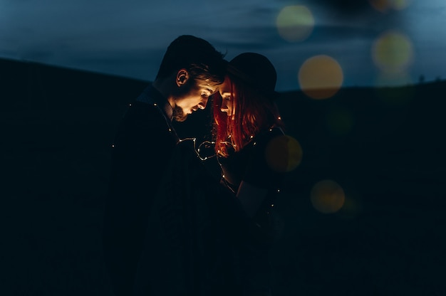 Photo beautiful young couple photo shoot outdoors