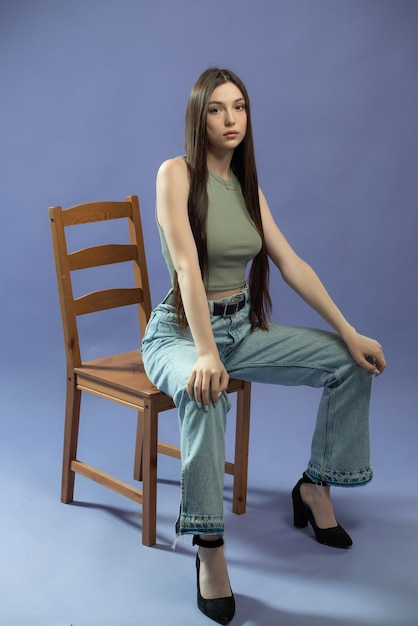 Beautiful young fashion woman posing in studio