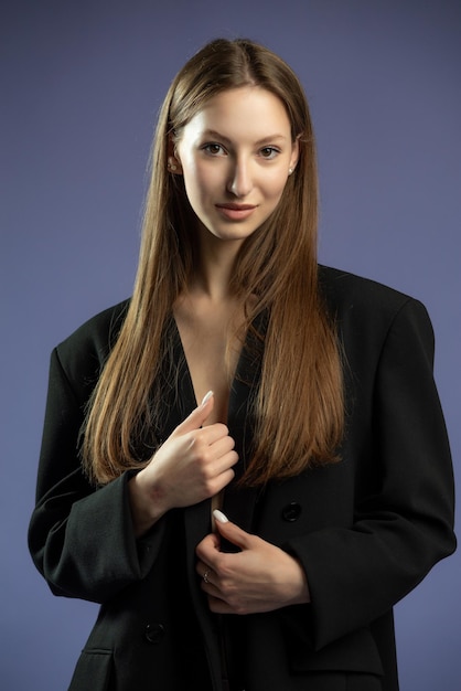 Beautiful young fashion woman in studio