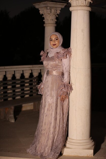 beautiful young female model wearing hijab Evening Dress free photo