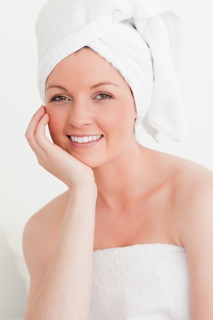 Beautiful young female wrapped in a towel