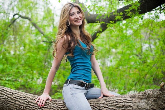 Beautiful young girl resting in park