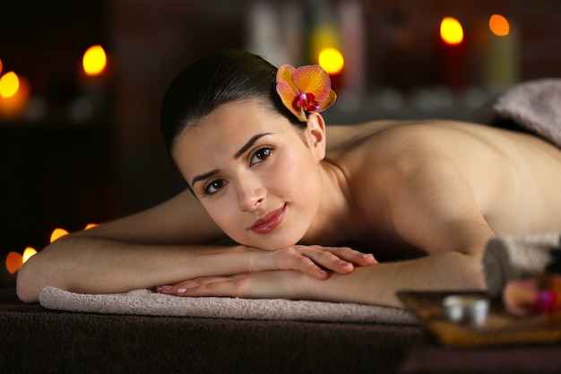 Beautiful young girl in spa salon