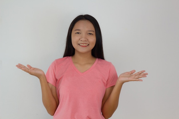 Beautiful young girl wear pink shirt and Jean on white background