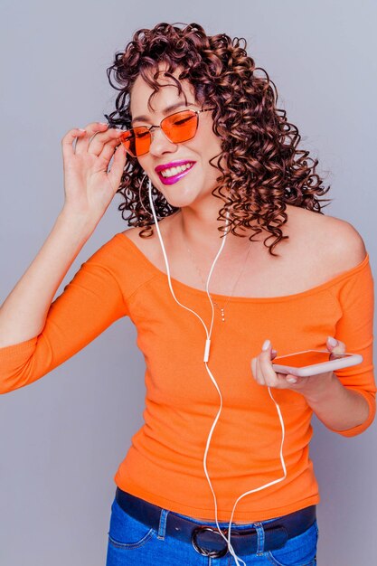 Beautiful young girl with curly hair