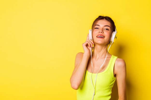 Beautiful  young girl with headphones