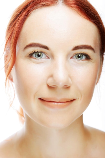 Beautiful young girl with red hair