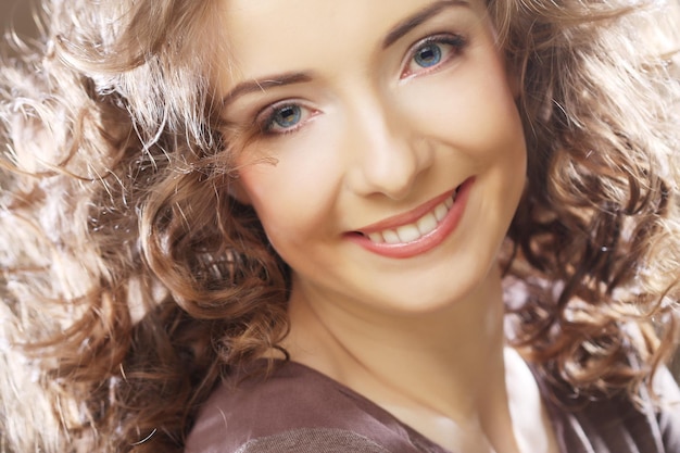 Beautiful young happy smiling woman